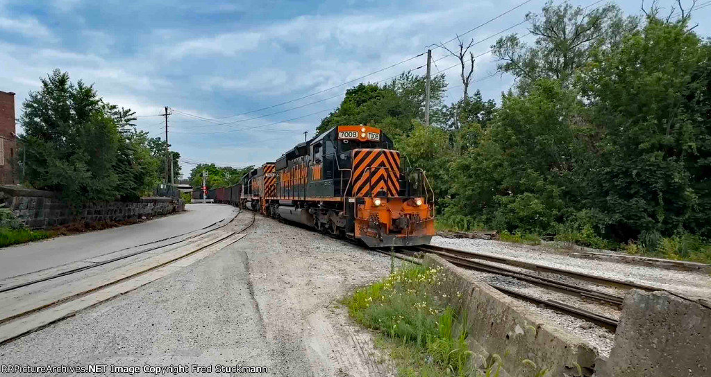 WE 7008 brings stone loads across Summit St.